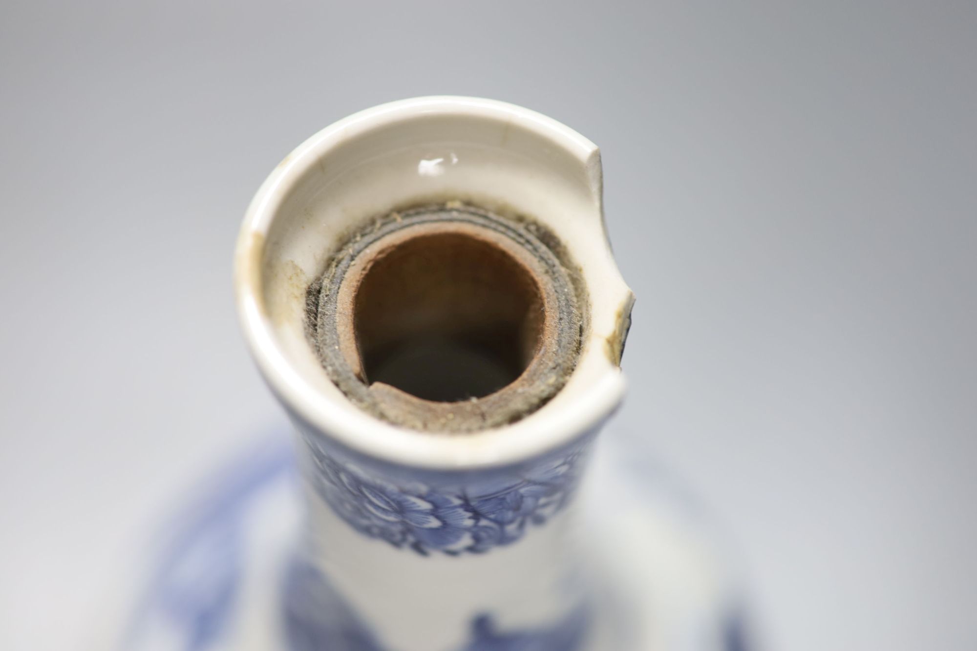 An 18th century Chinese blue and white guglet, once mounted as a lamp, height 25.5cm (drill hole to base)